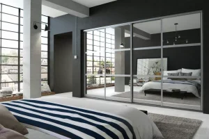 Set5Aluminium-Mirror002-1920w bedroom with a bed facing a wardrobe cabinet with mirrored sliding doors