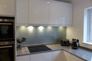Variouspics175-1920w L-shaped kitchen with gray countertop and hanging white glossy cabinets